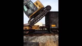 Unloading excavator from rail car [upl. by Artined900]