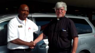 Father Dennis Hoffman buys a Toyota Sienna at Deery Brothers11 [upl. by Stanleigh823]