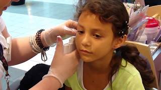 Julia getting her ears pierced at Claires in the mall [upl. by Tobe]