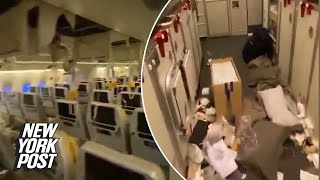 Video chaotic aftermath in cabin of turbulent Singapore Airlines flight that killed one passenger [upl. by Eardnoed]