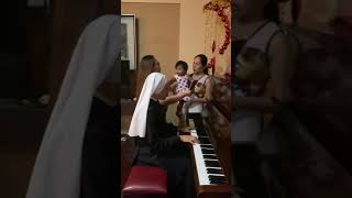 Singing “Hoy Despierto by SIERVAS”accompanied by Sr Kathleen Redido [upl. by Macguiness]