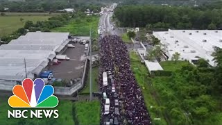 Thousands Join Migrant Caravan Moving Through Mexico To US Border [upl. by Natsyrt927]