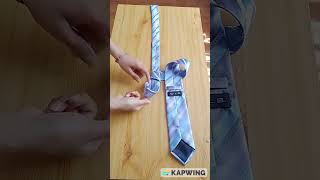 How to Tie a Tie in 10 Seconds Full Windsor Knot [upl. by Treb839]