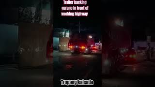 Trailer backing garage in front of working highway trailertruckdriving [upl. by Gabriela]