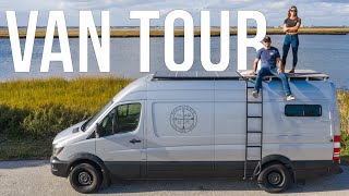 DIY VAN TOUR  FullTime Travel Couple  Shower Roof Deck and Convertible Bed  Van Life [upl. by Cis72]