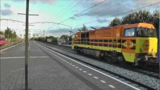 2811 NMBS IC Brussel en 1101 Vossloh G2000 BB RRF met goederntrein passeren station Zwijndrecht [upl. by Assinna]