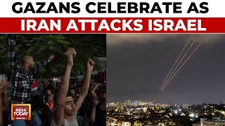 IsraelIran War Gazans Celebrate As Skies Over Israel Flooded With Missiles [upl. by Sldney326]