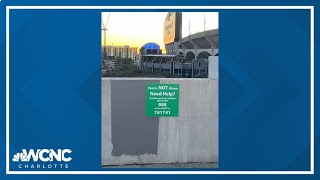 Charlotte womans suicide prevention signs set up at Uptown parking deck [upl. by Ysnil]