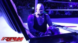 Undertaker rises from a coffin to attack Brock Lesnar Raw March 24 2014 [upl. by Goebel953]