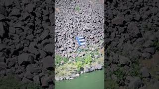 Guy base jumps off the Perrine Memorial Bridge in Twin Falls Idaho with an inflatable boat [upl. by Innor]