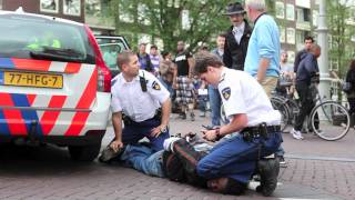 Amsterdam officers arrest suspect  June 20 2011 1759 [upl. by Pineda149]