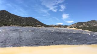 Heap Leach Video  Clifton Mine  pregnant solution pond [upl. by Charters876]