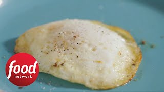 How to Fry Eggs Like a Pro  Food Network [upl. by Gem]