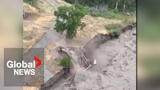 BC landslide Structure washed away after water tops Chilcotin River site video shows [upl. by Eirrem669]