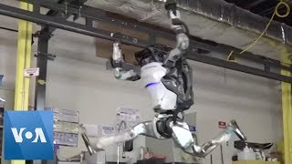 Boston Dynamics’ Humanoid Robot Shows Off Gymnastic Routine [upl. by Aplihs]