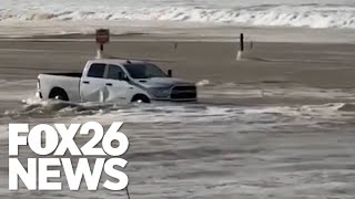 Ferocious waves destroy millions in offroad vehicles at Central California beach [upl. by Ocsisnarf253]