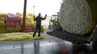 unwrapping cotton bales at broadview co op gin firebaugh ca [upl. by Tavis]