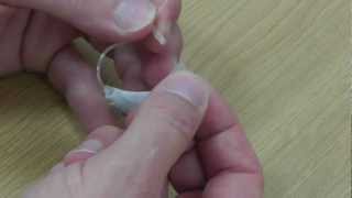 HOW TO change the dome amp slim tube on a BTE behind the ear hearing aid [upl. by Kesley]