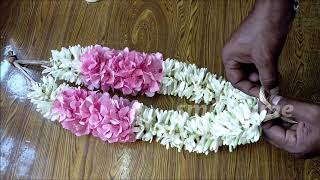 How to string flower sampangi poo malai kattuvathu eppadi easy method பூ மாலை கட்டுவது எப்படி [upl. by Arnon711]