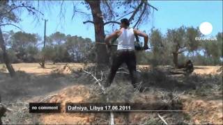 Libyan rebels fighting proGadhafi forces [upl. by Niffirg]