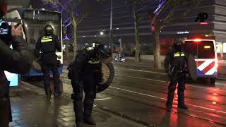 Rioters throw stones at vehicles and police in Amsterdam three arrests made [upl. by Alaham289]