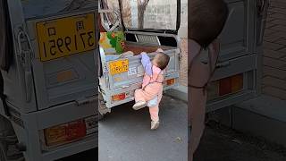 Oneyearold baby is very good at getting in the car funny cutebaby [upl. by Aihsar758]