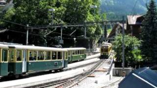 Trains crossing in Wengen [upl. by Oderfigis]