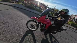 250cc motorcycle life  quotCan it do a wheeliequot  Suzuki TU250x with KLR650 [upl. by Koziel434]