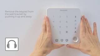 Replacing the batteries on the keypad  Alarms  Honeywell Home [upl. by Stevy935]