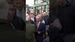 Farright Nigel Farage has milkshake thrown over him [upl. by Enilesoj]