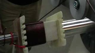 Winding a power distribution transformer on an EZ1200 winding machine [upl. by Giraldo]