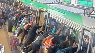 Man freed from train gap in Australia as passengers get out and push [upl. by Llemmart]