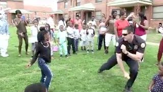 Watch Police Office Challenge Residents To DanceOff While On Patrol [upl. by Sergent]