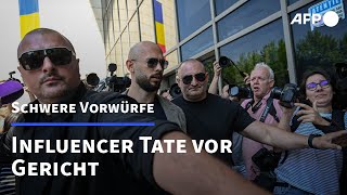 Influencer Tate erscheint in Rumänien vor Gericht  AFP [upl. by Eizeerb]