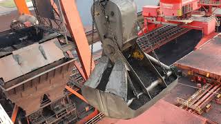 Unloading a 300 meter coal bulk ship Bucket crane with massive bucket close to the wheelhouse [upl. by Longfellow]