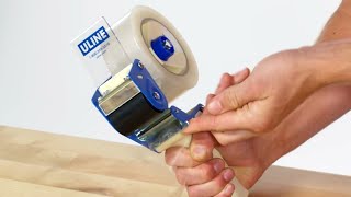 How to Load a Packing Tape Gun Dispenser [upl. by Razec129]