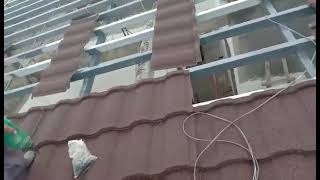 Installing stone coated roof [upl. by Erna]