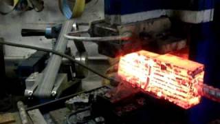 Initial forge weld of damascus billet under hydraulic press [upl. by Lanos]