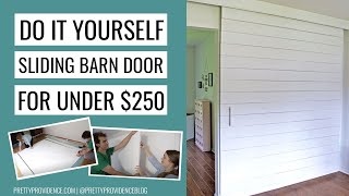 DIY Sliding Barn Door for Under 250 [upl. by Werd183]