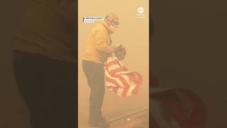 Firefighter saves American flag from California wildfire [upl. by Saleme]