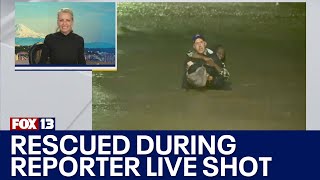 WATCH Weather reporter rescues woman during live shot in GA [upl. by Dor930]