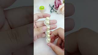 ✨TUTORIEL Porteclés floral en perles 🌸 DIYperles Porteclés Création Noeudpapillon cadeaux [upl. by Bree422]