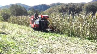 Kuhn MC 90S TWIN 2 row chopper on a IHI round baler MYUNGSUNG South Korea [upl. by Ausoj]