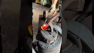 Forging a sickle at high temperature [upl. by Ynnor]