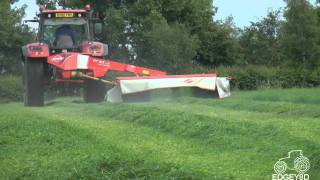 McCormick MTX 135 Mowing with a Kuhn FC 313 mower Silage 2011 [upl. by Aelyak840]