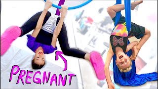 PREGNANT LADY DOES ACROBATS WITH CHILD [upl. by Eimaj853]