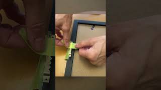 Hang a Sawtooth Hook on a picture frame  fast and easy shorts [upl. by Nnaarat]