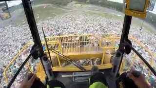 Operating TANA E320eco landfill compactor [upl. by Ledairam]