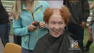 Football Team Goes Bald To Support 4th Grader Battling Cancer [upl. by Ocin132]