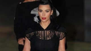 Kim Kardashian Covers up Baby Bump on Jimmy Kimmel Live [upl. by Ahsenal696]